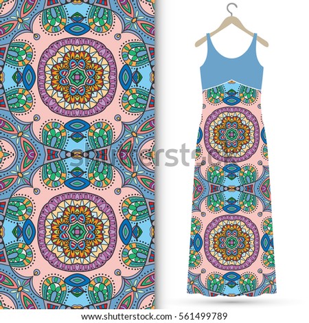 Beautiful fashion illustration. Women's dress on a hanger and seamless hand drawn pattern for textile, paper print. Isolated colorful dress and vertical seamless background, vector fashion collection