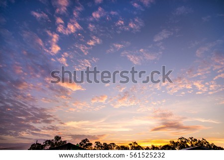 Beautiful nature background - red sunset, bright sun Royalty-Free Stock Photo #561525232