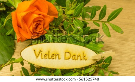 A bouquet with lettering in german many thanks