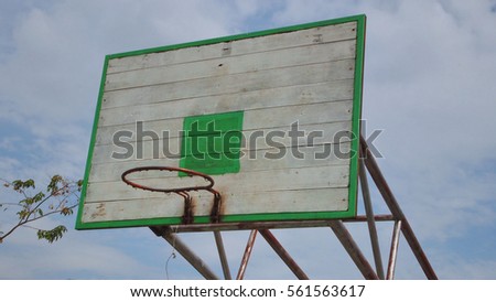 Basketball hoop and backboard  whit blue sky background