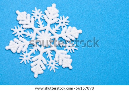 Snowflakes on Blue Background Image for Winter and Holiday Concepts.