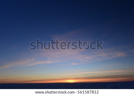 Clear blue sky at sunset over the Gulf of Finland