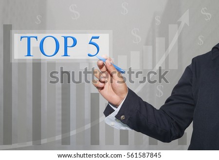 Hand of businessman Write a text of TOP5 in concept of presenting ideas in your business. Royalty-Free Stock Photo #561587845