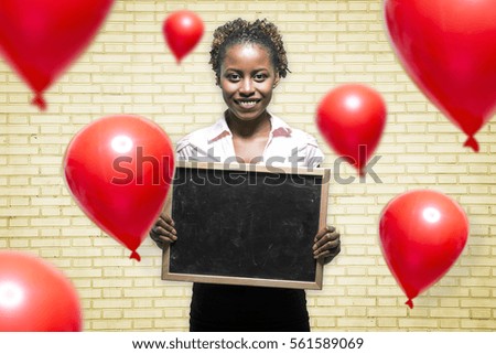 Black business girl with a blackboard