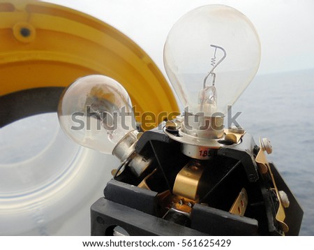 Check navigation lights bulbs on the oil & gas offshore wellhead platform.