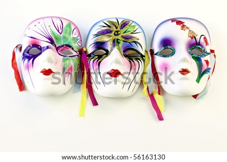 Mardi gras masks over a white background
