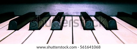 black and white keys of the old piano