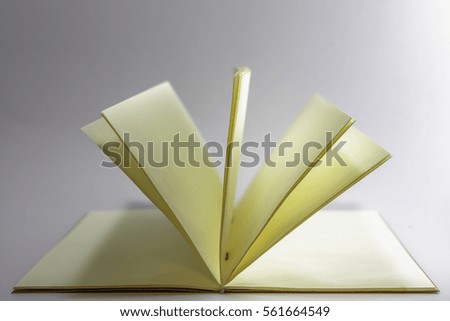 Book opening isolated on white background