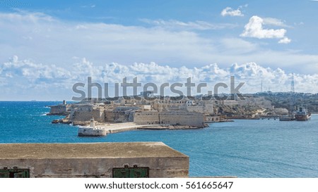 picture with the view from valletta cross to birgu
