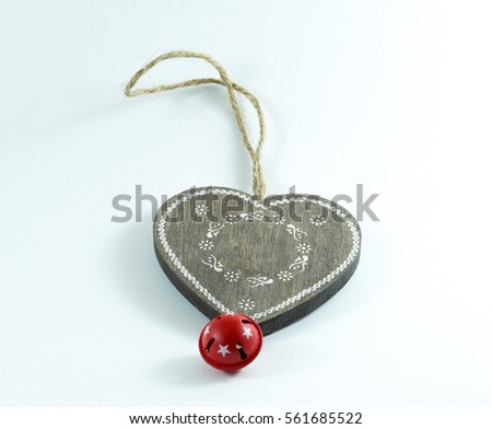Wooden heart necklance on a white background
