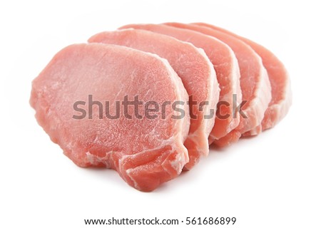 Meat, pork, slices pork loin on a white background Royalty-Free Stock Photo #561686899