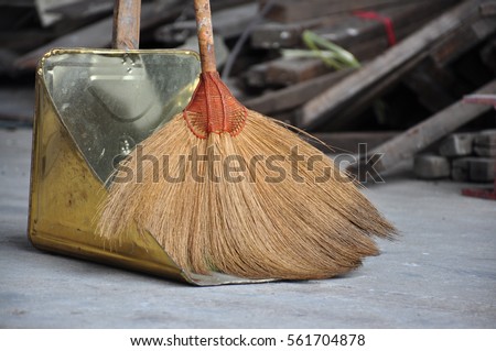 Whisk broom and dustpan Royalty-Free Stock Photo #561704878