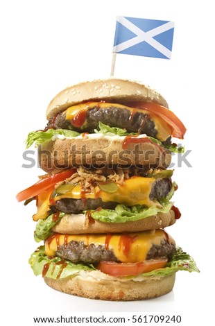 Fresh and tasty XXL hamburger with the flag of Scotland.(series)