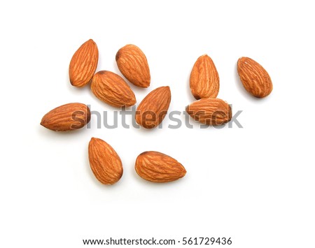 Almonds isolated on white background Royalty-Free Stock Photo #561729436