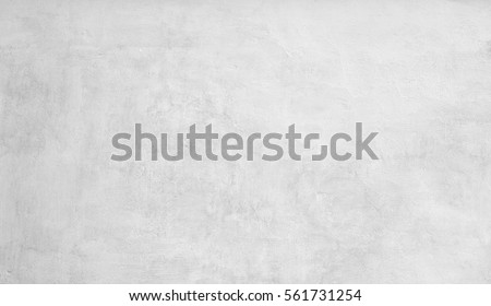 White stucco wall background. White painted cement wall texture Royalty-Free Stock Photo #561731254