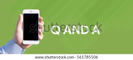 Smart phone in hand front of green background and written Q AND A