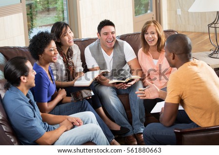 Diverse small group of people studying. Royalty-Free Stock Photo #561880663
