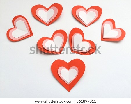 Overlapping paper red heart isolated on pink background. You can use as greeting card with text or with out text "Happy Valentine's Day"