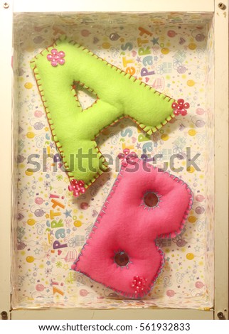 Beautiful colour capital letter A,B in the frame