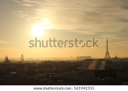 City of Paris. going from the street. Roads, car, sunset, sun, pedestrians.