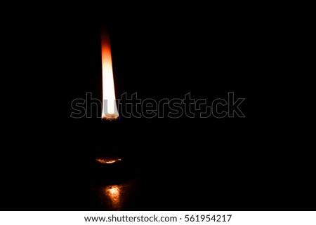 lighting with candle inside Lantern.