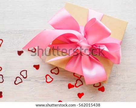 Cute decorated gift pack for present with pink ribbon