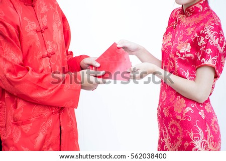 Asian couple in cheongsam suit. Happy chinese new year concept
