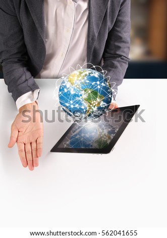 hands holding and pointing on contemporary digital tablet