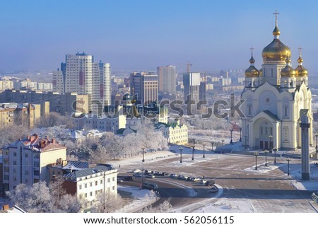 Frosty morning in Khabarovsk. Glory square. Transfiguration Cathedral. Far East, Russia. Royalty-Free Stock Photo #562056115