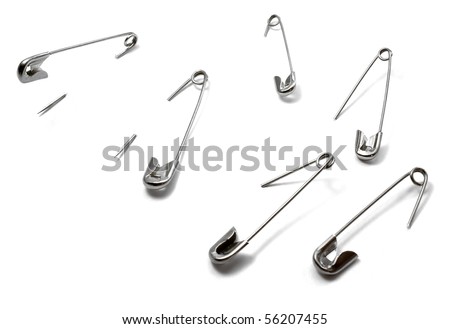 Isolated, open safety pin in white background Royalty-Free Stock Photo #56207455