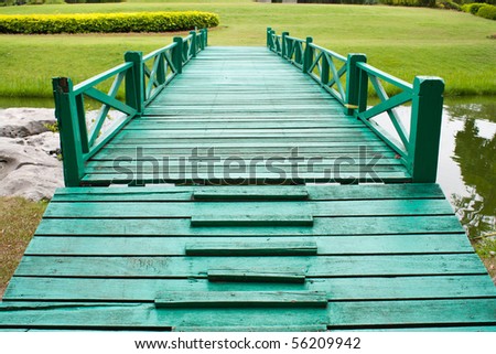 bridge and the yard in the park,grass green