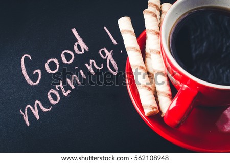 Cup of Coffee and Cookie or Biscuit on a Dark Background. Inscription Good Morning. Toned Image. Selective Focus. Top View.