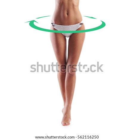 Close-up of thin and beautiful female body. Weight loss, sports, exercising, healthy food and eating, nutrition concept. Green arrows.