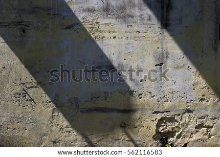 Rustic old derelict charming traditional architecture colonial prewar shophouses temples iconic structures wall texture peeling paint shadow South East Asia city island state Singapore Malaysia 