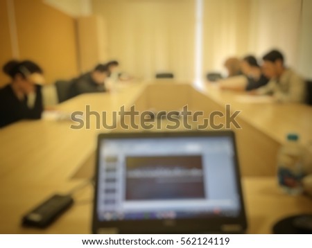 Blurred image of computer room in secondary,university. Network communication for education. Student using learning and teaching during study.