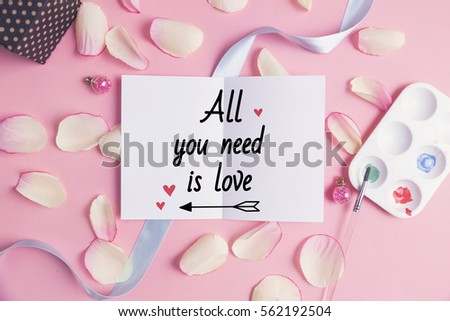 All you nees is love on pastel background.