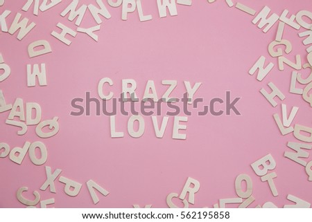 Sorting letters Crazy love on pink.