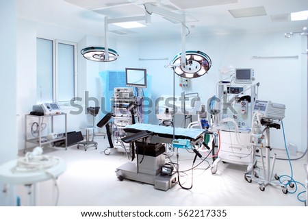 Interior of operating room in modern clinic Royalty-Free Stock Photo #562217335