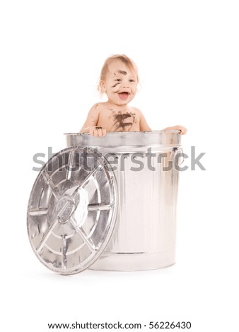 picture of adorable baby in trash can