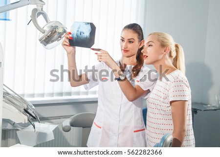 Doctor and patient looking an x-ray picture