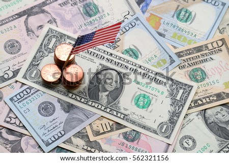 US flag sign and Dollar cash banknote and coin background, USA finance and economy concept