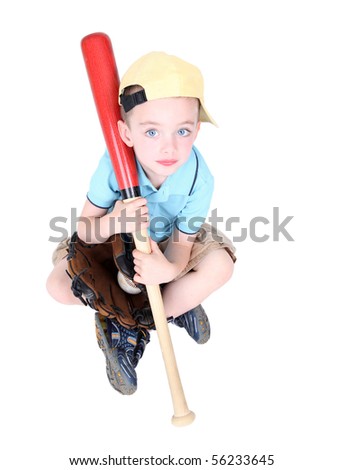 Young preschool boy holding bat in studio on white background