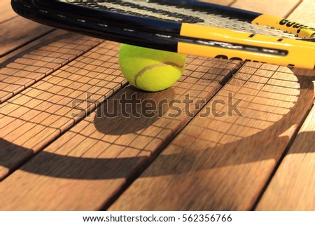 Tennis balls and racquet