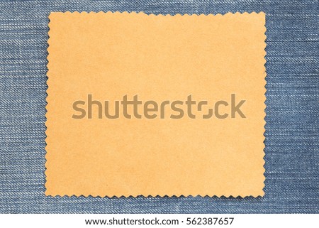 Brown cardboard of empty and copy space on Denim background,You can input the message text in picture.