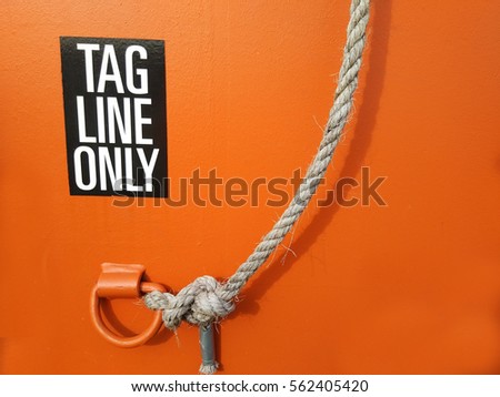 A view of handle with signage for Tag line only on open tray for offshore drilling