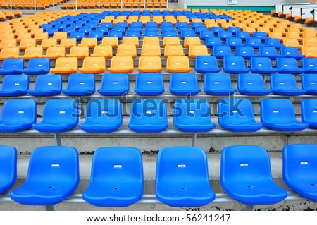 blue and orange seat in stadium