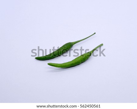 Couple green chili on white isolated background.