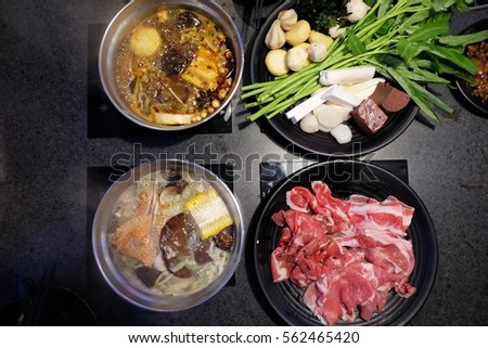 Hongkong style hot pot and buffet, Mongkok,, Thailand.
Hot pot refers to several East Asian varieties of stew, consisting of a simmering metal pot of stock at the center of the dining table.