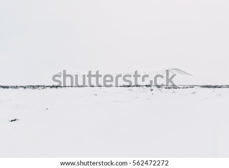 Hverfjall volcano covered in snowy shades of white, myvatn area, Iceland. Horizontal photo