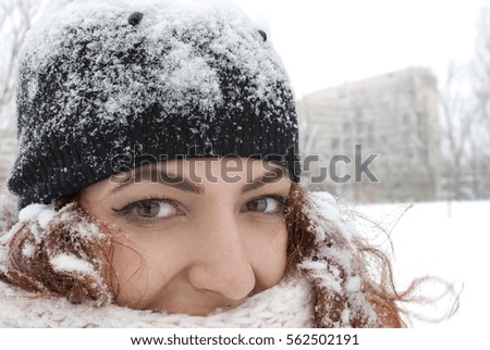 Portrait of beautiful woman - snow in winter